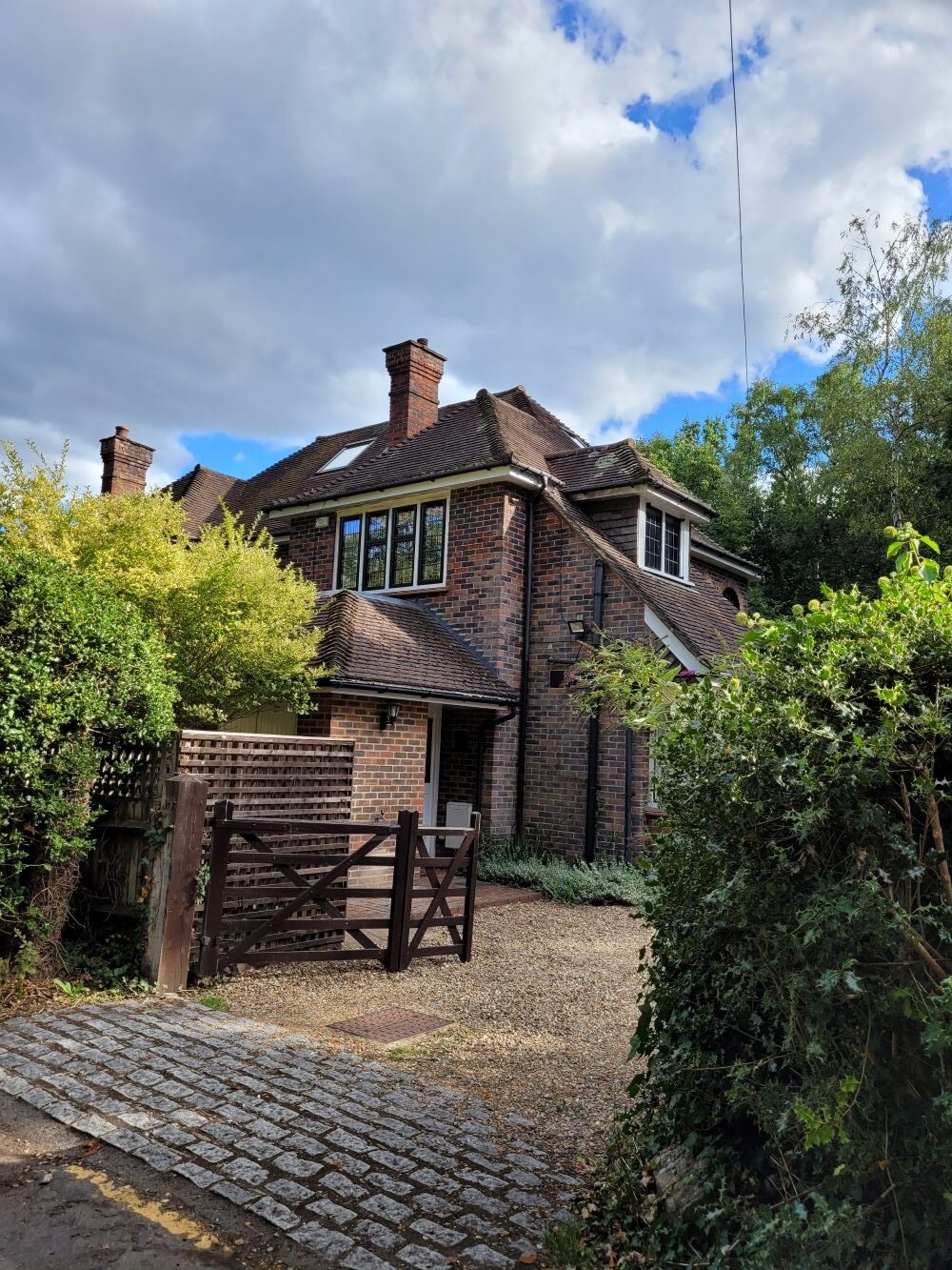 woking loft conversion complete external photograph timber gate