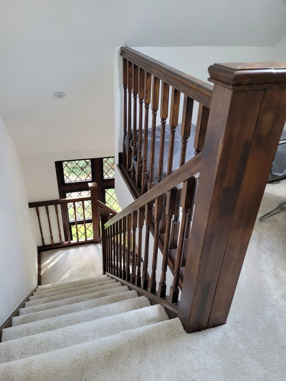 woking loft conversion internal solid wood staircase with carpet photograph