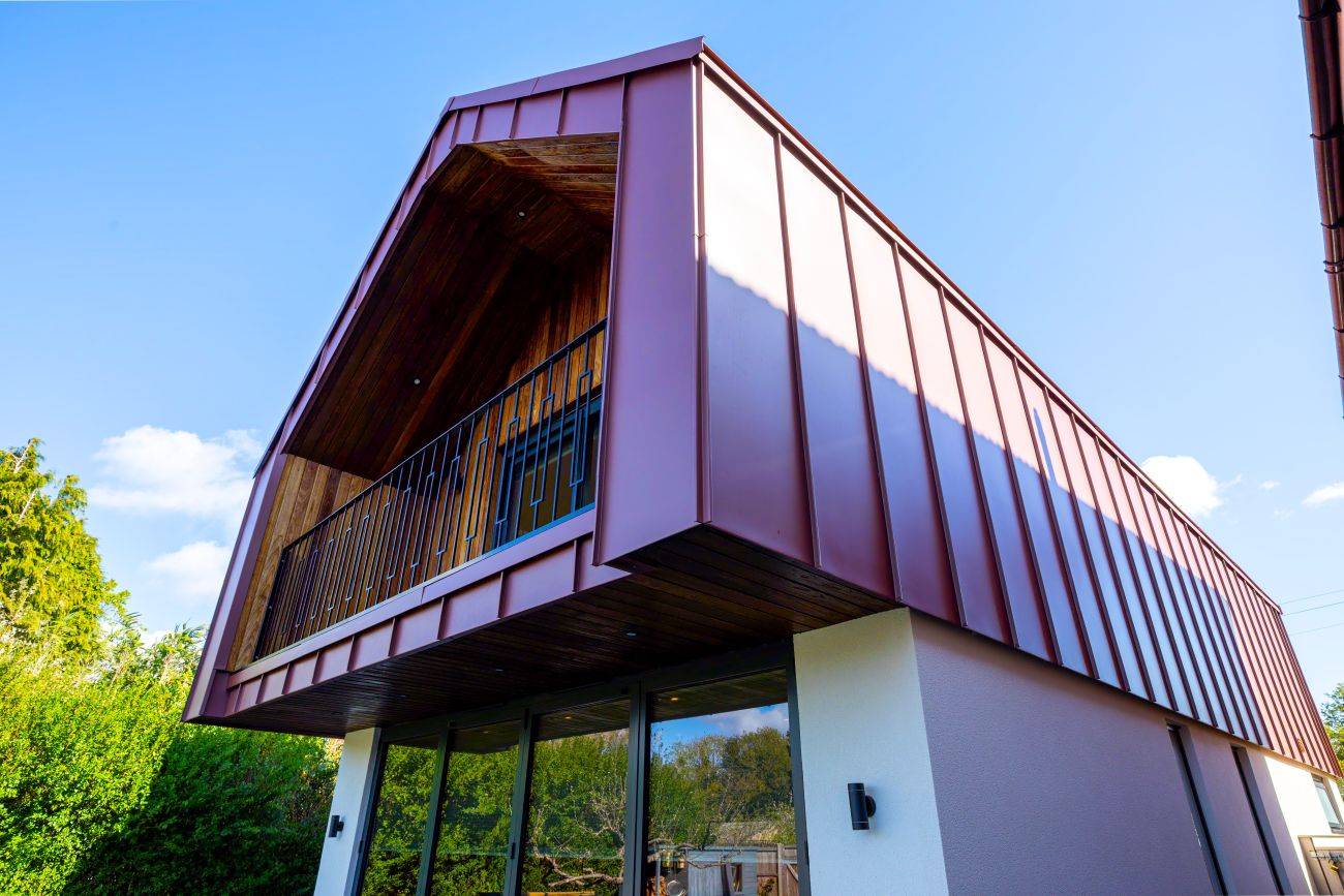 Stunning part zinc clad executive home in Send Stunning part zinc clad executive home in Send