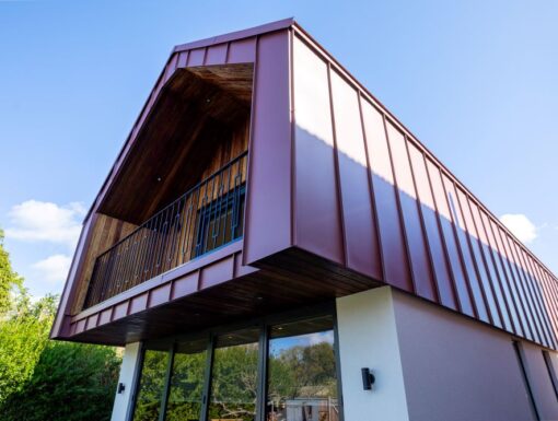 Convert a dormer bungalow into a stunning part zinc clad executive home - completed outside