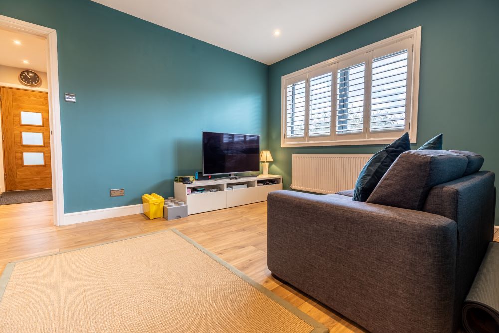 Convert a dormer bungalow into a stunning part zinc clad executive home - completed living room