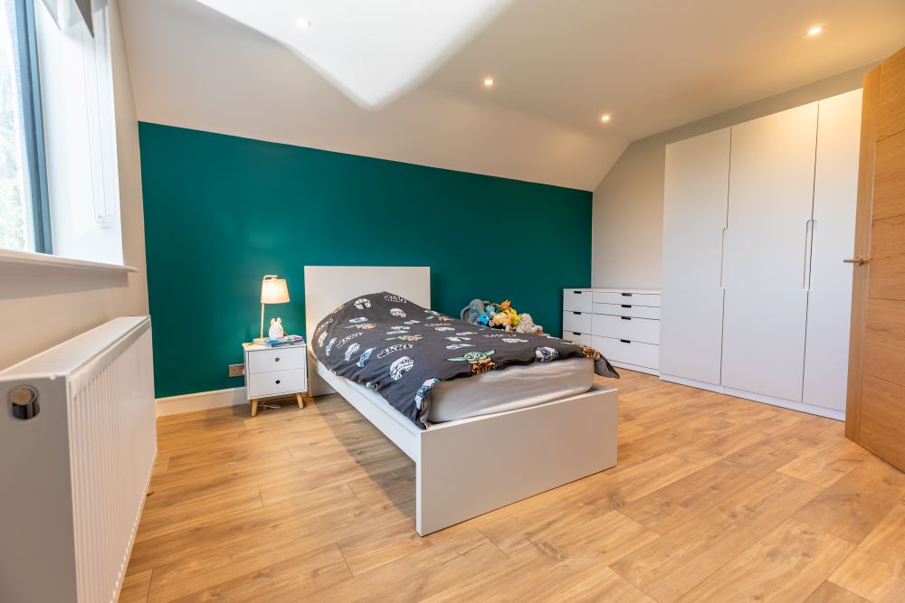 Convert a dormer bungalow into a stunning part zinc clad executive home - completed bedroom