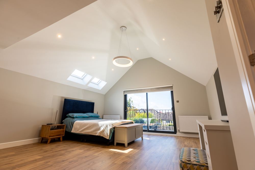 Convert a dormer bungalow into a stunning part zinc clad executive home - completed bedroom