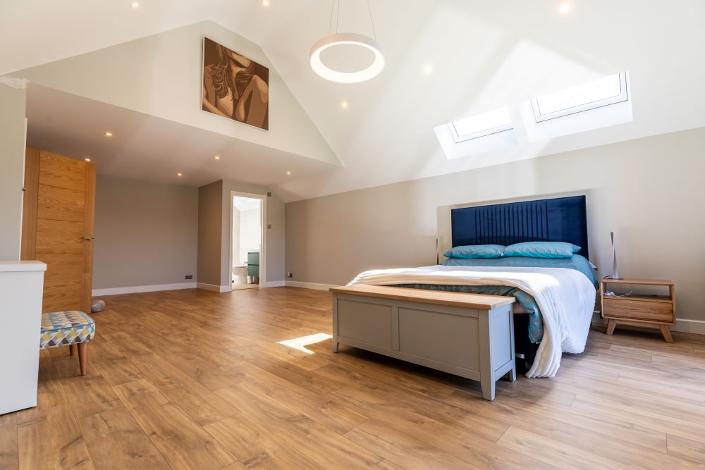 Convert a dormer bungalow into a stunning part zinc clad executive home - completed bedroom