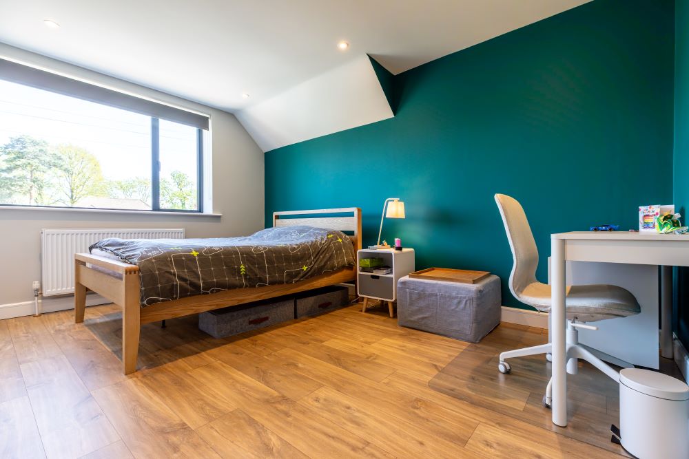 Convert a dormer bungalow into a stunning part zinc clad executive home - completed bedroom