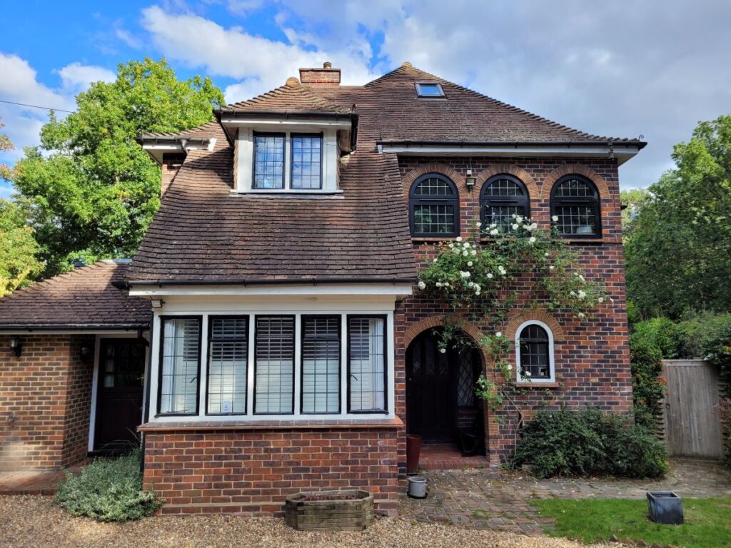 woking loft conversion complete external photograph balcony infill
